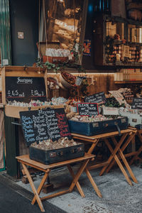 Variety of saucissons on sale at a charcuterie stand inside borough market, london, uk.