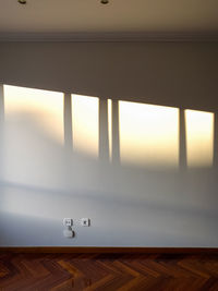 View of wooden floor against wall