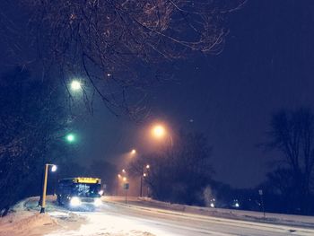 Cars on road at night