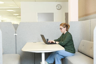 Woman using laptop