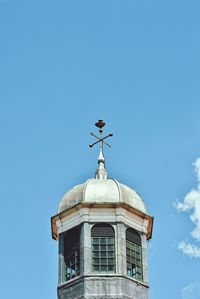 Low angle view of building against clear blue sky