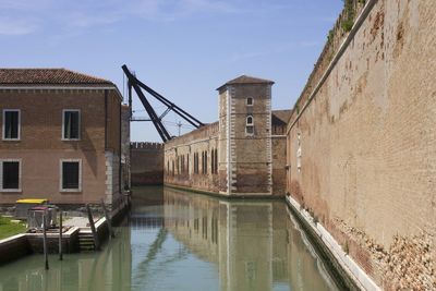 Rio de le vergini in venice, with the historic arsenal walls