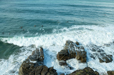 Waves splashing on rocks