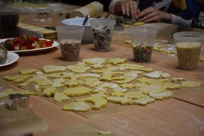 Dough molded in various shapes by ingredients on table