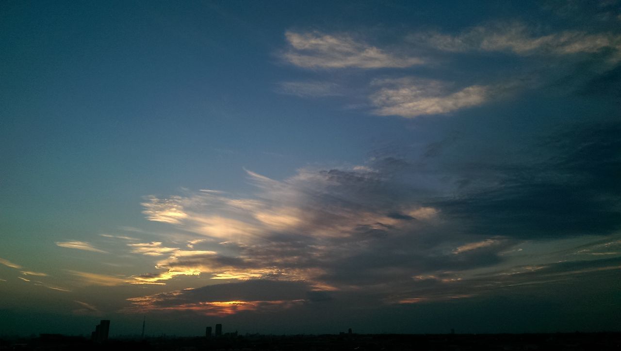 sky, sunset, silhouette, scenics, beauty in nature, tranquility, tranquil scene, cloud - sky, nature, low angle view, idyllic, landscape, cloud, dusk, dramatic sky, blue, outdoors, cloudy, no people, dark