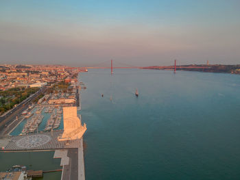 View of suspension bridge over sea