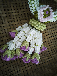 High angle view of pink flowers in basket