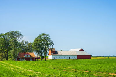 Farmhouse with a barn in the countryside