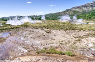 Smoke emitting from volcanic mountain