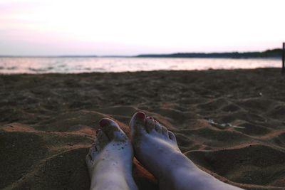 Low section of people on beach