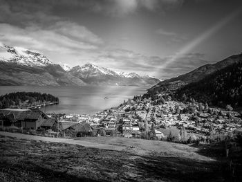 Scenic view of farm against sky
