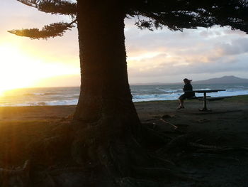 Scenic view of sea at sunset