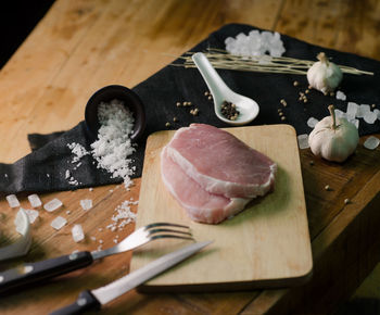 Close-up of meat on cutting board