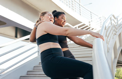 Side view of woman exercising in gym