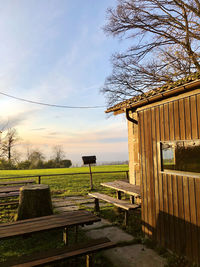 House on field against sky