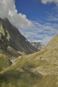 Morning view of mountains covered with clouds from the peak with bhaga river in darcha