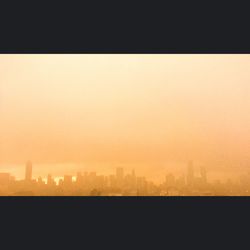 View of cityscape at sunset