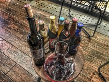 High angle view of beer bottles on table