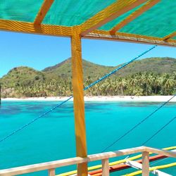 Scenic view of sea against clear blue sky