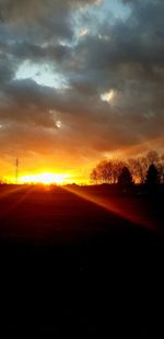 Scenic view of silhouette landscape against sky during sunset