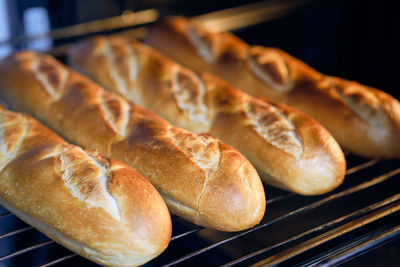 Close-up of crispy browned bread rolls baked in the oven