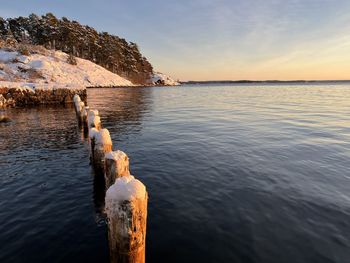 Scenic view of sea against sky during sunset