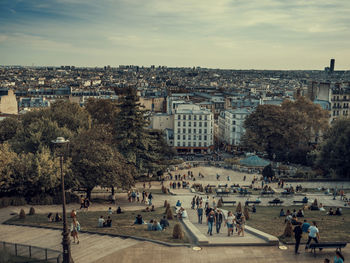 High angle view of people and buildings in city