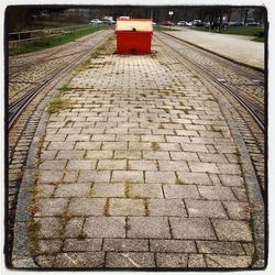 Railroad tracks on road