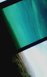 Close-up of window against the sky