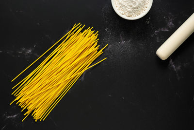 High angle view of food on table against black background