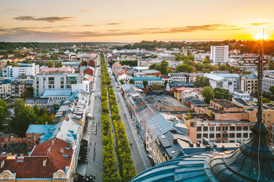 High angle view of buildings against sky at sunset