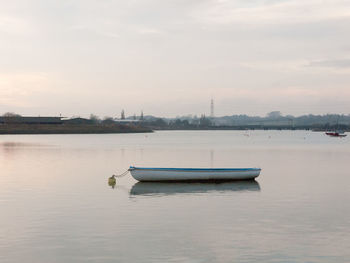 Boat in sea against sky