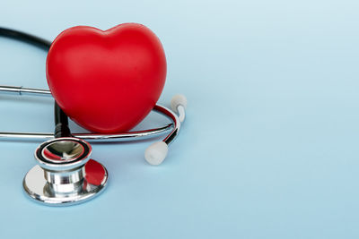 High angle view of red heart shape on table