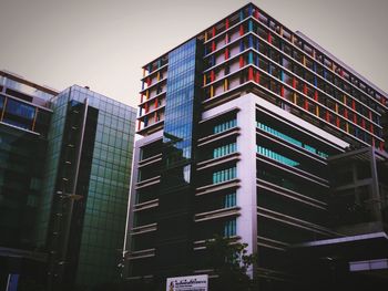 Low angle view of modern building against sky