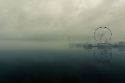 Capital wheel on harbor at potomac river in foggy weather