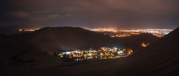 High angle view of illuminated desert at night