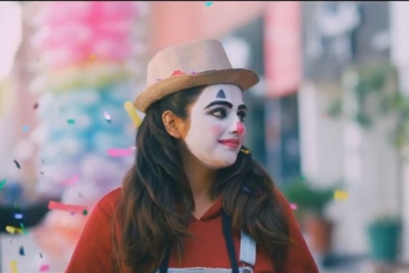 headshot, hat, young adult, portrait, looking, lifestyles, young women, clothing, one person, looking away, fashion, focus on foreground, adult, leisure activity, women, real people, beauty, beautiful woman, long hair, hairstyle, outdoors, warm clothing, retail display, contemplation