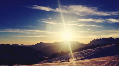 Scenic view of mountains against sky during sunset