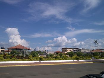 Road with buildings in background