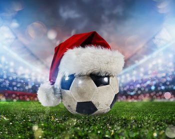 Close-up of soccer ball on field