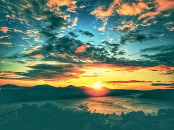 Scenic view of dramatic sky during sunset