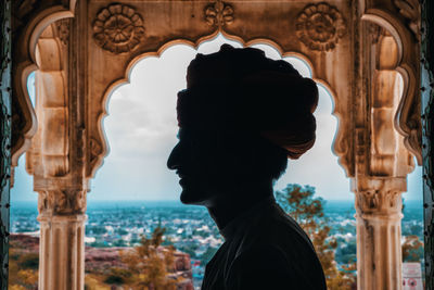 Portrait of man in historic building