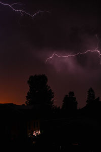 Scenic view of lightning in sky at night