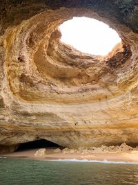 Scenic view of rock formation in sea
