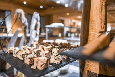 Roquefort cheese pieces displayed in tray on buffet counter at resort