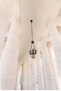 Low angle view of pendant light hanging from ceiling