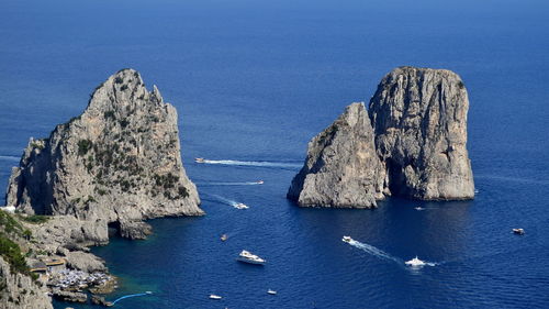 High angle view of rocks in sea