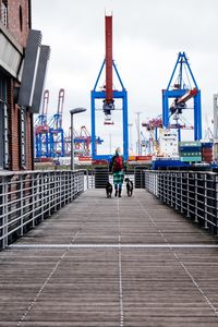 People walking in front of building