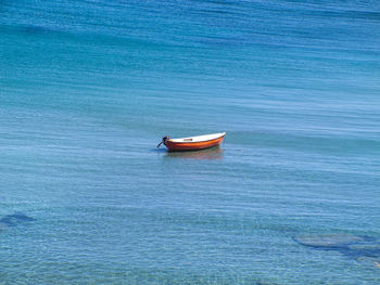 Boat moored on sea