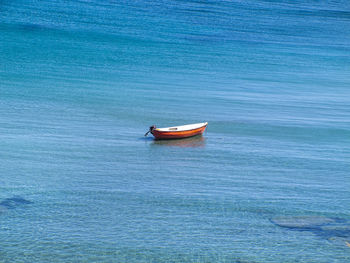 Boat moored on sea